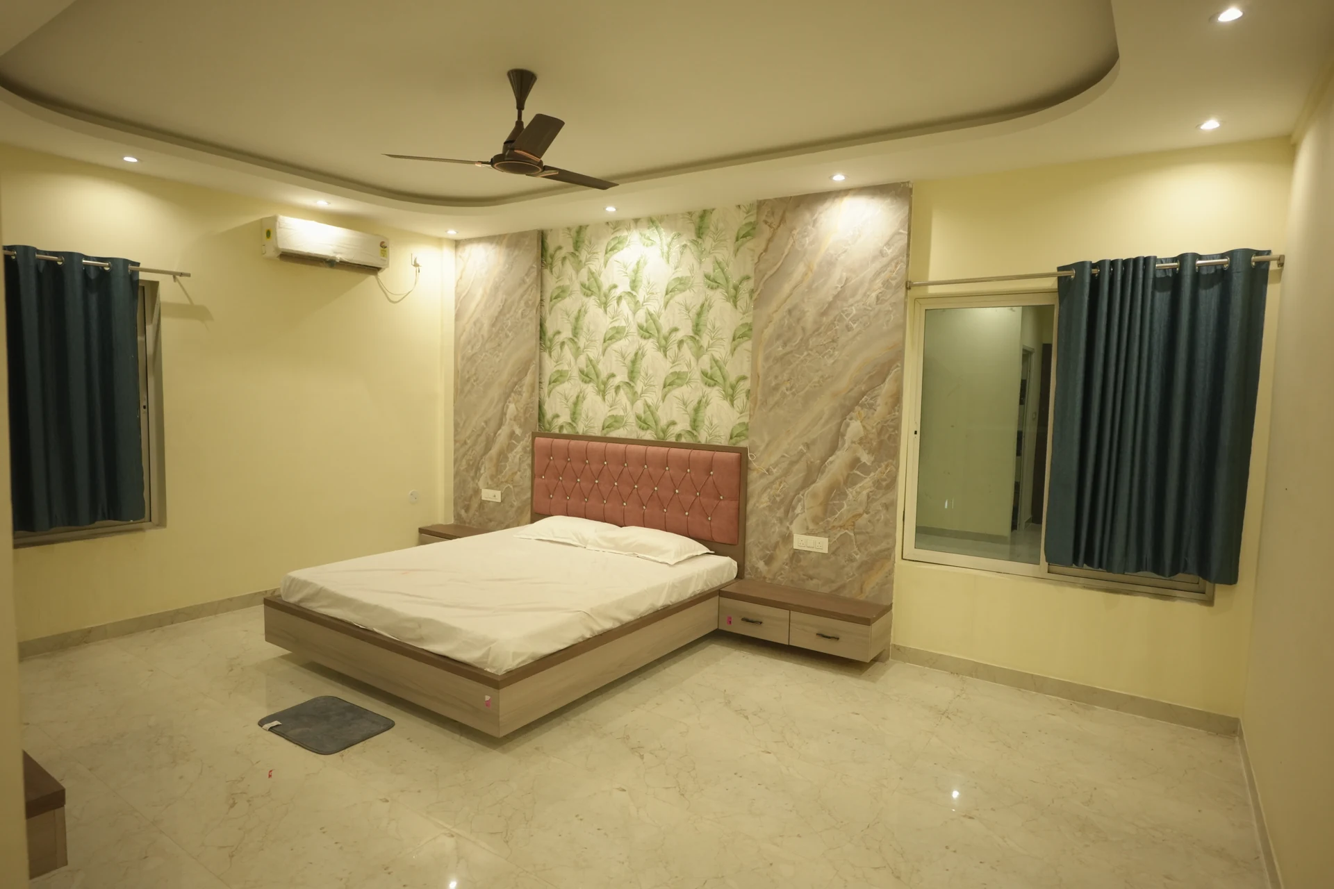 A guest room at Vaishnavi Resort